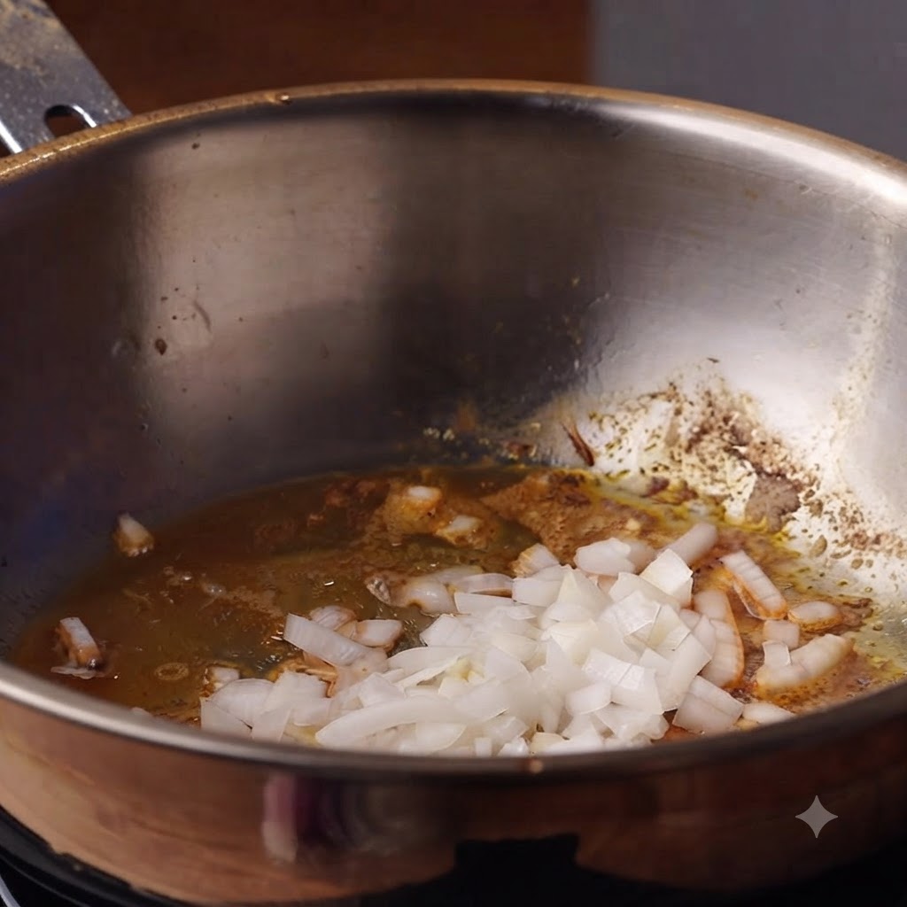 Gehackte Zwiebeln und Knoblauch garen in Öl in einem tiefen Topf.
