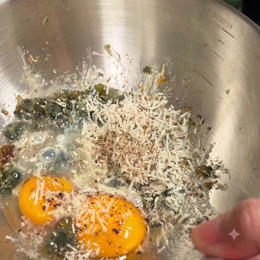 Ladle pouring hot boiling water into the metal bowl with the egg and cheese mixture.